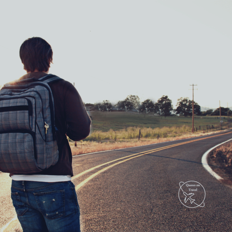 man walking along a road alone - solo travel quotes